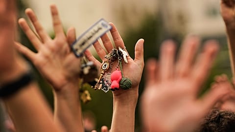 FILE. People hold up keys as a sign of protest during a demonstration demanding stronger laws to protect renters in Madrid, Spain, 3 Oct. 2026