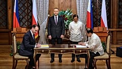 Polish and Philippine officials sign a crime-fighting agreement at Malacanang Palace in Manila, Philippines, Tuesday, Oct. 6, 2026.