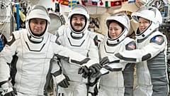 From left to right: Andrey Fedyaev (Roscosmos), Jack Hathaway, Jessica Meir (NASA) and Sophie Adenot (ESA) aboard SpaceX's Dragon spacecraft, on 6 October 2026.
