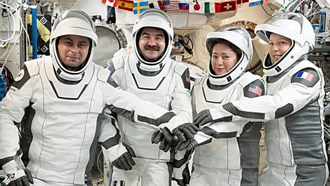 From left to right: Andrey Fedyaev (Roscosmos), Jack Hathaway, Jessica Meir (NASA) and Sophie Adenot (ESA) aboard SpaceX's Dragon spacecraft, on 6 October 2026.