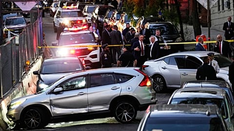 Law enforcement work the scene of a shooting Thursday, Oct. 8, 2026, in New York