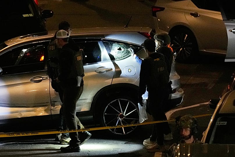 FBI agents perform an investigation at the scene of a shooting on Thursday, Oct. 8, 2026, in New York