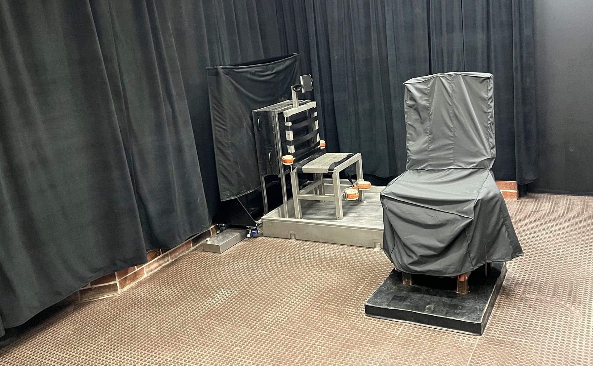 FILE - Display of the state's death chamber in Columbia, South Carolina, including the electric chair, right, and a firing squad chair, left.