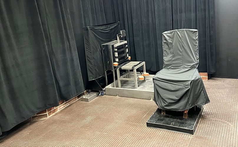 FILE - Display of the state's death chamber in Columbia, South Carolina, including the electric chair, right, and a firing squad chair, left.