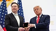 President Donald Trump, right, presents the National Medal of Science to Elon Musk during an event at the U.S. Institute of Peace, Thursday, Oct. 8, 2026.