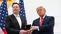 President Donald Trump, right, presents the National Medal of Science to Elon Musk during an event at the U.S. Institute of Peace, Thursday, Oct. 8, 2026.