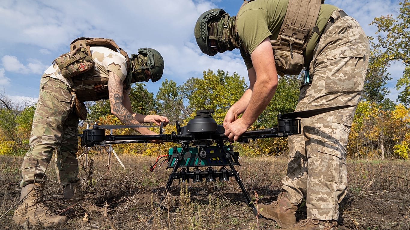 Ukrainian servicemen practicing munition drops at an undisclosed location in Kharkiv region, Ukraine, Thursday, Oct. 8, 2026.