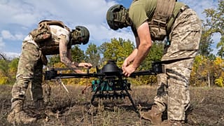 Ukrainian servicemen practicing munition drops at an undisclosed location in Kharkiv region, Ukraine, Thursday, Oct. 8, 2026.