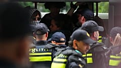 Police detain protesters during a rally against the NATO summit in The Hague, Netherlands, Wednesday, June 25, 2025.
