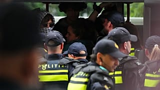Police detain protesters during a rally against the NATO summit in The Hague, Netherlands, Wednesday, June 25, 2025.