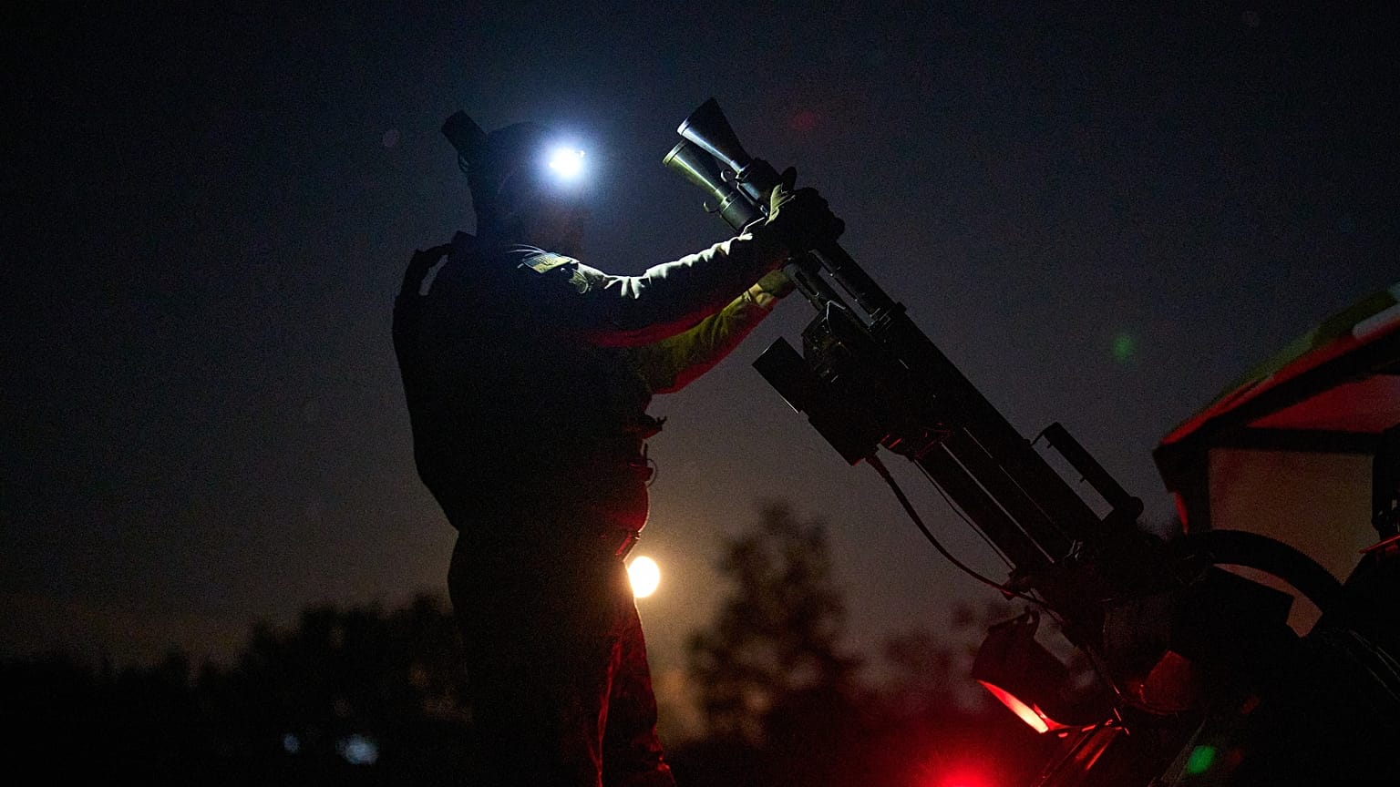 A Ukrainian air defense soldier gets ready to repel Russia's drone attack in Kyiv, Ukraine, late Saturday, Sept. 19, 2026.