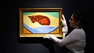 A painting by David Hockney called 'Dog Painting 17' is displayed at Christie's auction rooms. 