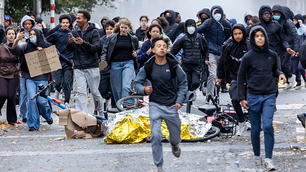 Police clash with protesters in Brussels as thousands march against spending cuts