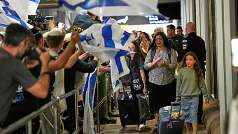 Israeli passengers from a Flydubai flight that made an emergency landing in Saudi Arabia arrive at Ben Gurion Airport near Tel Aviv on 30 September 2026.