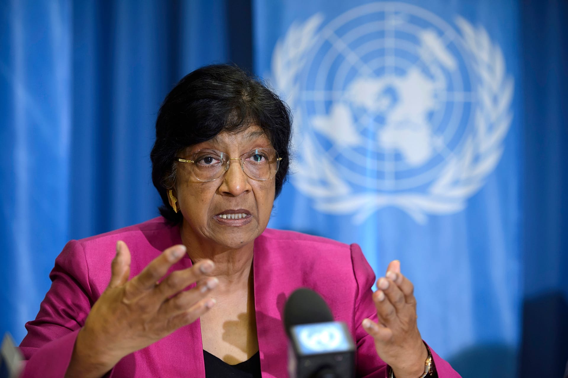 Navi Pillay answers journalist's questions during a press conference at the Geneva Press Club, in Geneva, Switzerland, July 31, 2014.
