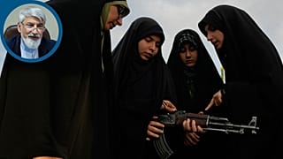 Volunteers train how to handle a Kalashnikov-style assault rifle 