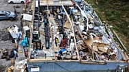People salvage the contents of their destroyed mini mart in the aftermath of Hurricane Isaias in Milton, Fla., Saturday, Oct. 10, 2026.