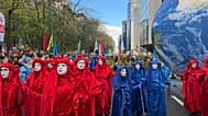 Protesters march in Brussels demanding greater action to combat climate change. Sunday Oct. 10, 2026.