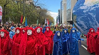 Protesters march in Brussels demanding greater action to combat climate change. Sunday Oct. 10, 2026.