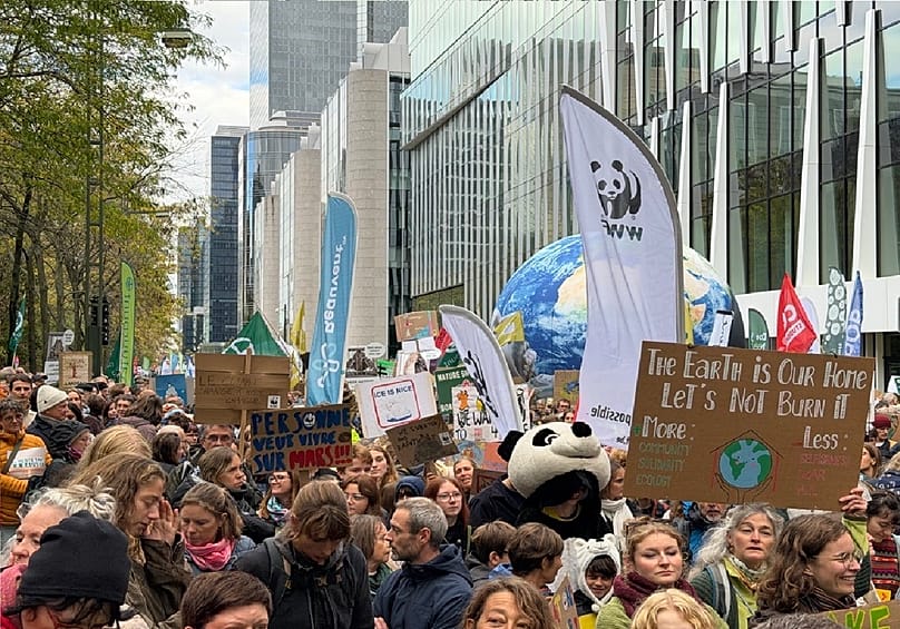 Protesters at the starting point of the climate march in Brussels, Belgium urging for action against climate change. Sunday Oct. 10, 2026.