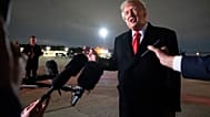 President Donald Trump speaks with reporters as he arrives on Air Force One, Saturday, 10 October 2026.