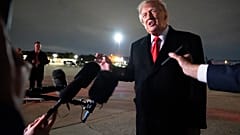 President Donald Trump speaks with reporters as he arrives on Air Force One, Saturday, 10 October 2026.