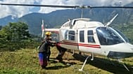 In this photo provided by the Nepal Army, residents affected by the flooding in Budhi Gandaki river in north central Nepal, are evacuated by a helicopter, 11 October 2026.