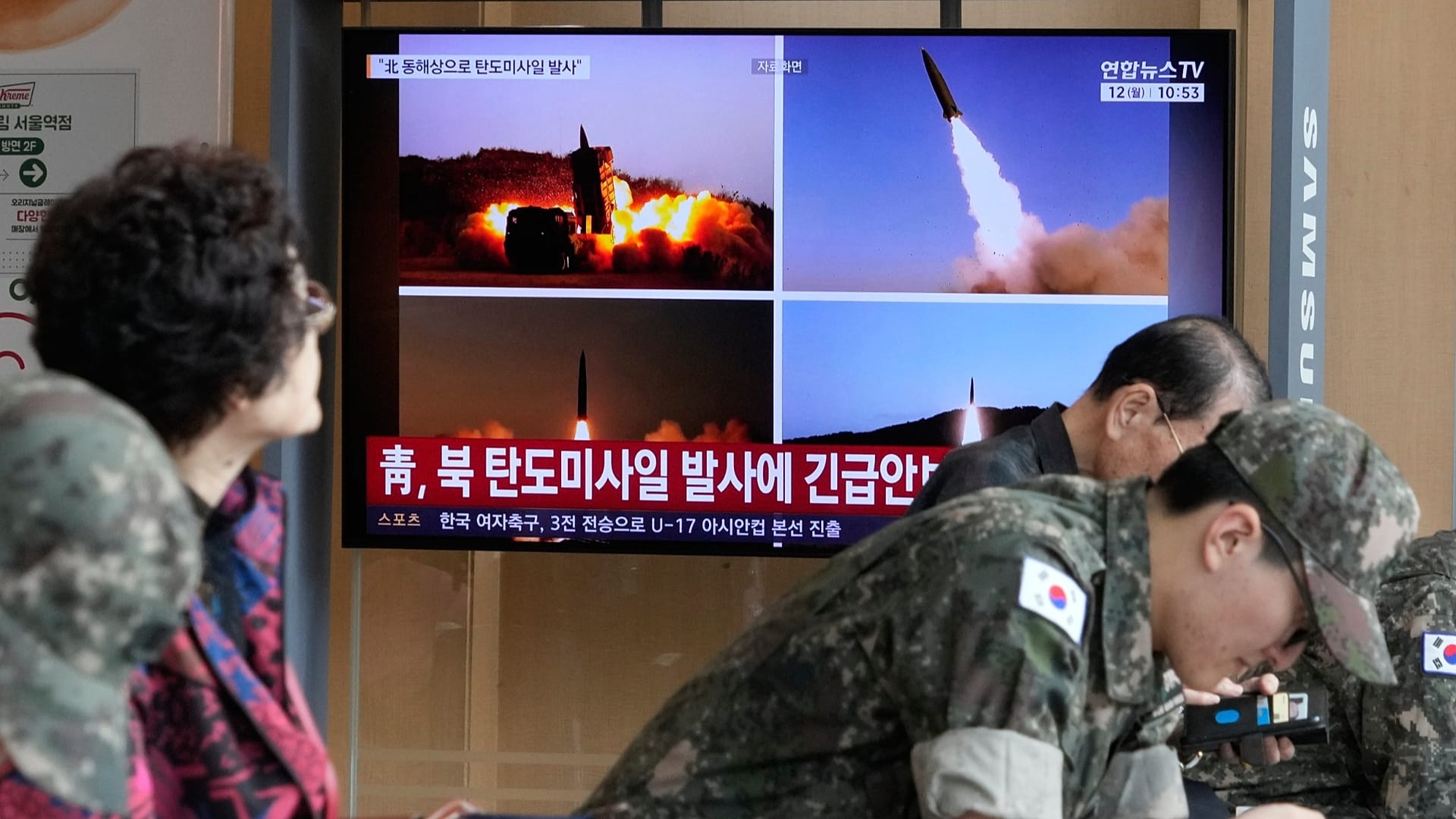A TV screen shows file images of North Korean missiles launch during a news programme at Seoul Railway Station, 12 October, 2026