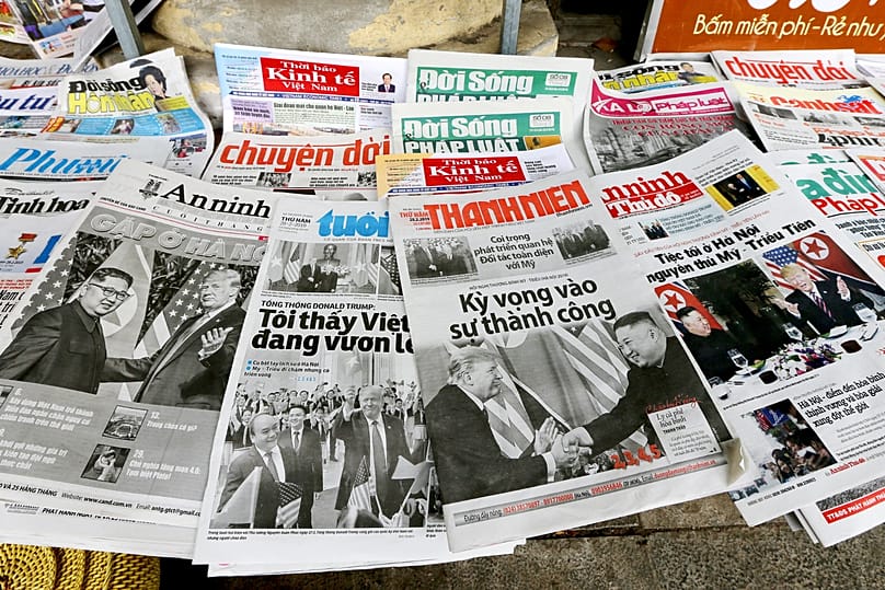 Newspapers with pictures of US President Donald Trump and North Korean leader Kim Jong-un displayed at a newspaper stall in Hanoi, 28 February, 2019