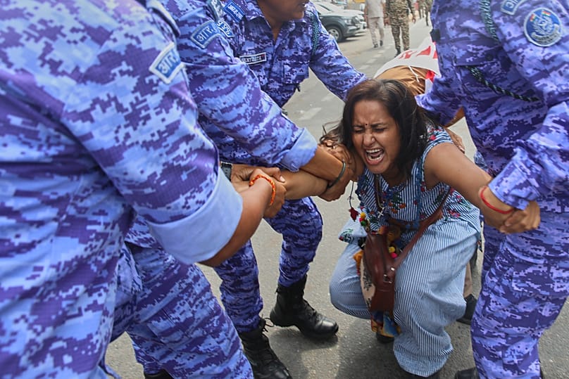 Police detain a protester during a youth demonstration demanding the resignation of the country's election chief in New Delhi, 11 October, 2026