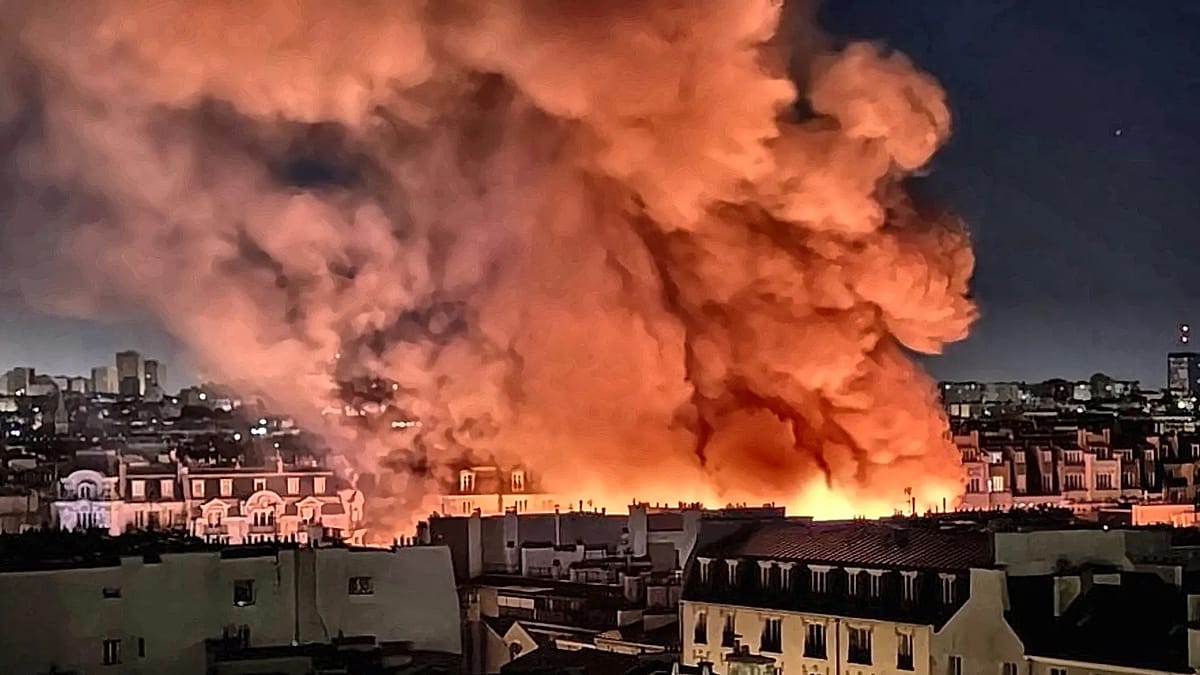 Fire totally destroys oldest covered food market in Paris, authorities say