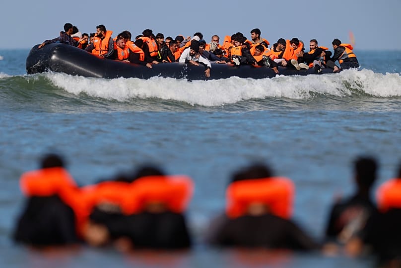A group of migrants attempt to cross the English Channel in a dinghy off Hardelot, northern France, Wednesday, Sept. 23, 2026.