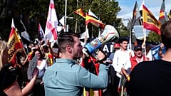 Protesters waving Spanish flags at a demonstration in Barcelona against the government’s handling of the migration crisis in Ceuta