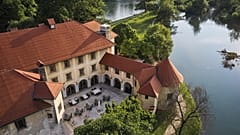 Le fughe romantiche in stile gotico in strutture come l'Hotel Grad Otocec Relais & Châteaux sono in aumento