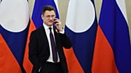 Russia's Deputy Prime Minister Alexander Novak speaks on the phone for the celebrations of the 81st anniversary of the Soviet Union's victory over Nazi Germany, May 2026. 