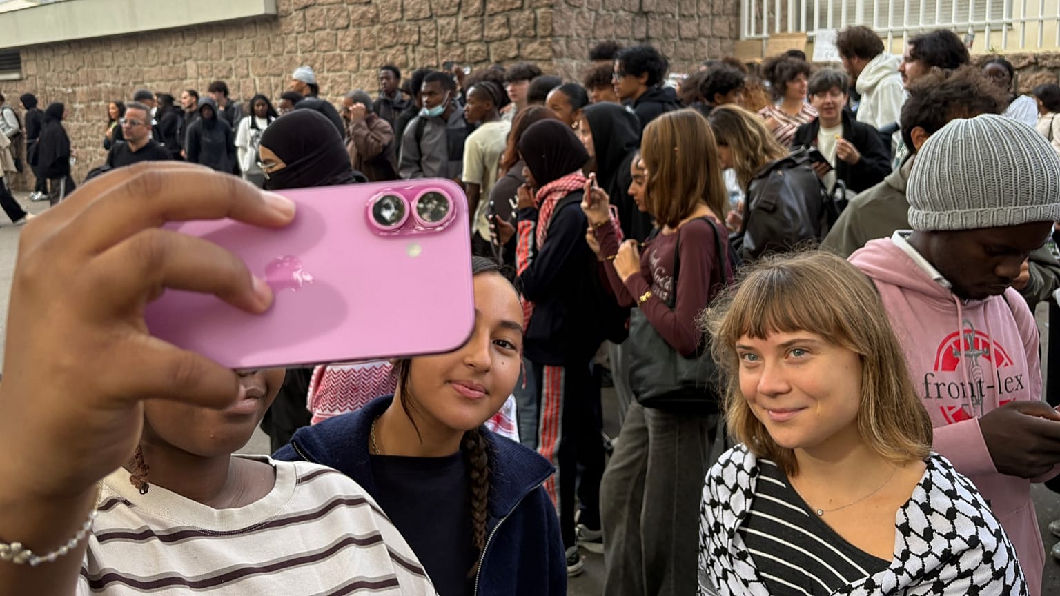 Greta Thunberg poses as she attends a gathering in front of Paul Eluard high school in Saint-Denis outside Paris, 13 October, 2026