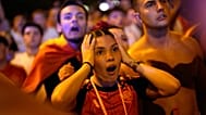 Aficionados españoles reaccionan mientras ven la final de la Copa del Mundo de fútbol entre España y Argentina en Madrid, el 19 de julio de 2026.