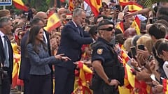King Felipe VI and Queen Letizia greet people along the route to City Hall, in Ceuta on Tuesday, 13 October