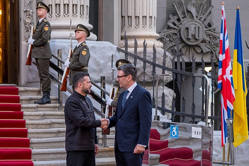 Britain's Prime Minister Andy Burnham, right, is welcomed by Ukraine's President Volodymyr Zelenskyy prior their meeting in Kyiv, Monday, Aug. 24, 2026.