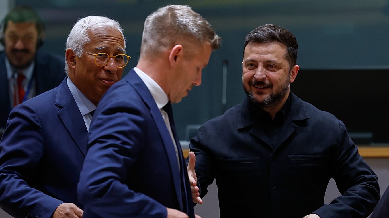 Ukraine's President Volodymyr Zelenskyy, right, greets Hungary's Prime Minister Peter Magyar, center, next to European Council President Antonio Costa during a round table mee