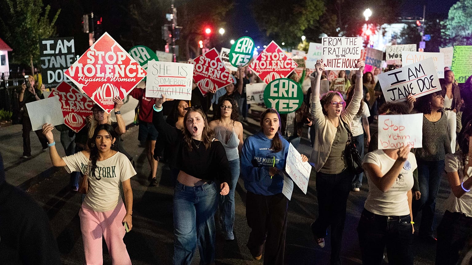 Demonstrators march to the White House from the Washington Monument during a "Stop Sexual Violence" protest Thursday, Oct. 8, 2026, in Washington.