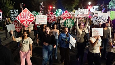 Demonstrators march to the White House from the Washington Monument during a "Stop Sexual Violence" protest Thursday, Oct. 8, 2026, in Washington.