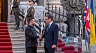 Britain's Prime Minister Andy Burnham, right, is welcomed by Ukraine's President Volodymyr Zelenskyy prior their meeting in Kyiv, Monday, Aug. 24, 2026
