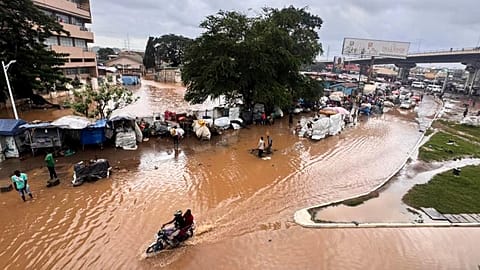 FILE: In this photo released by Ghana's National Disaster Management Organisation, flooded neighbourhoods are seen in Accra, 29 June 2026