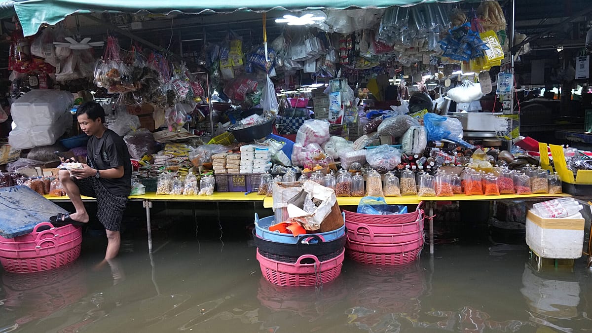 Flooded homes and rising costs: Why some Thai villages are paying the price to protect Bangkok