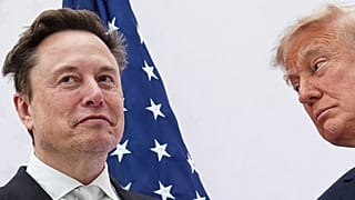 President Donald Trump, right, presents the National Medal of Science to Elon Musk at the U.S. Institute of Peace, Thursday, Oct. 8, 2026, in Washington. 