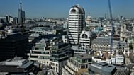 FILE - A view across the city towards St Pauls Cathedral in London