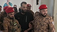 اقتياد مشتبه به لمحاكمة علنية بقصر عدل حلب (15 أكتوبر 2026) على خلفية اشتباكات الساحل الدامية في مارس 2025
