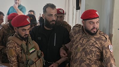 اقتياد مشتبه به لمحاكمة علنية بقصر عدل حلب (15 أكتوبر 2026) على خلفية اشتباكات الساحل الدامية في مارس 2025