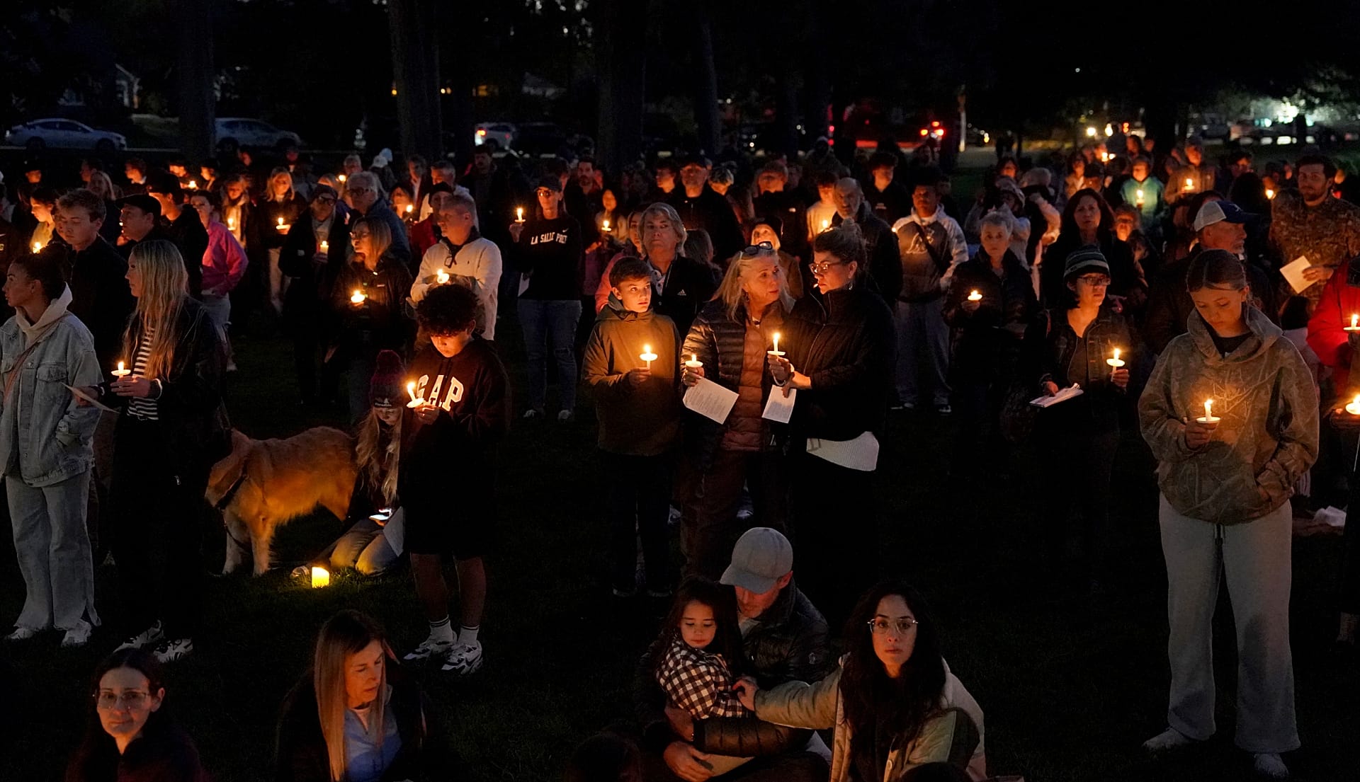People gather for a candlelight vigil held in Drake Park in Bend, 15 October, 2026